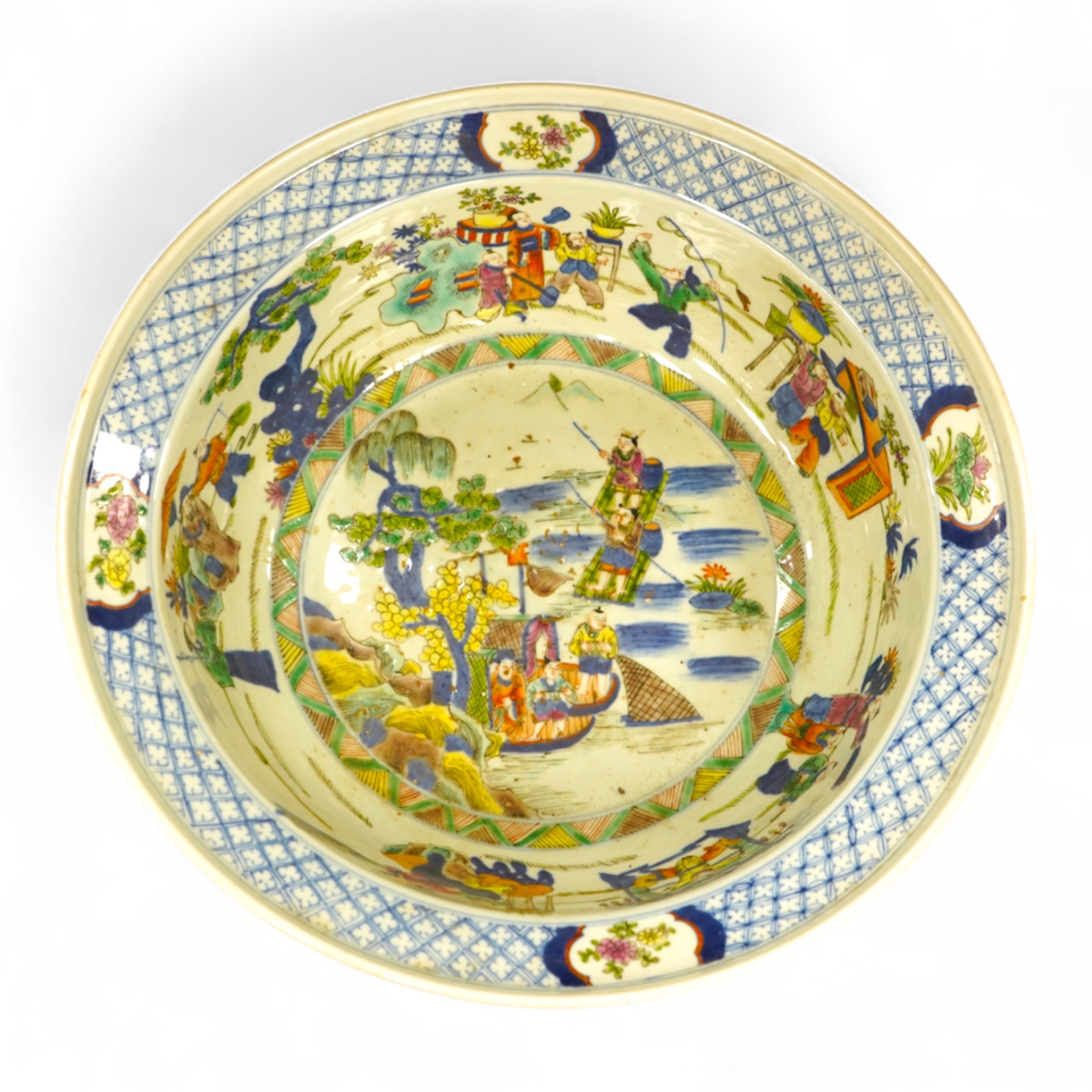 A large Chinese porcelain basin enamelled with figures, 41cm in diameter